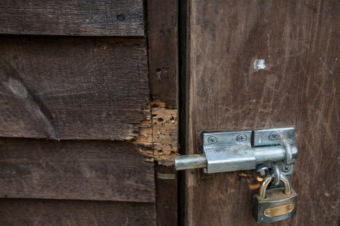 Lock Rusted Dark Shed Ultimate Shed Security Guide: Protect Your Bike and Tools in a Wooden